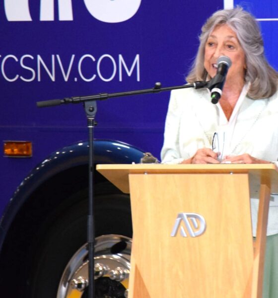 Dina Titus at Alexander Dennis double-decker bus facility grand opening in Las Vegas.